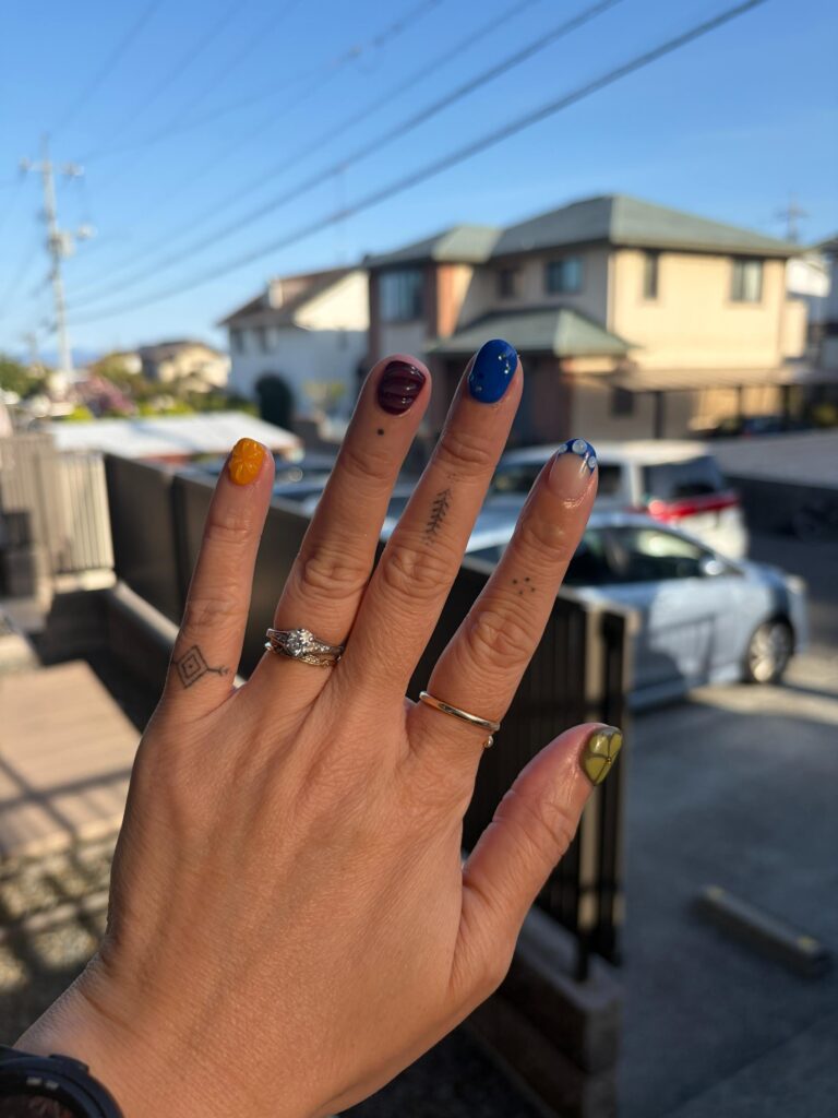 hand with tribal Filipino tattoos